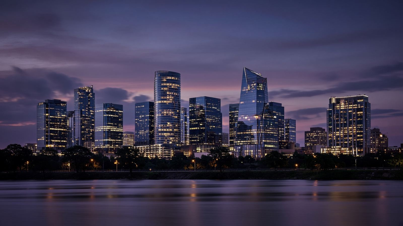Texas city skyline at dusk across the water